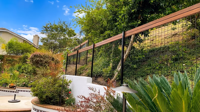 Custom IPE fence with wire mesh in Carlsbad